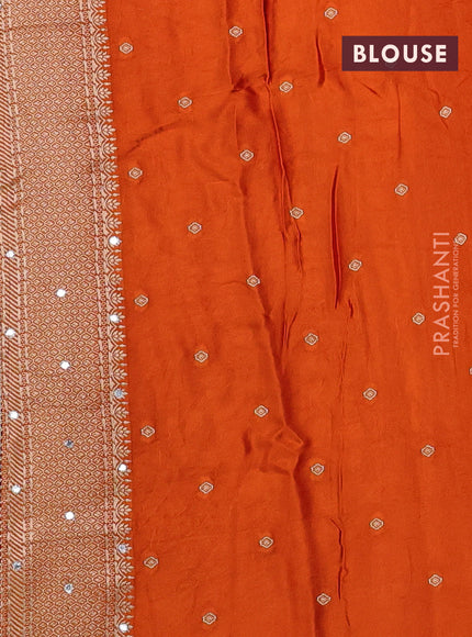 Banarasi silk saree orange with allover self emboss and mirror work embroidery pallu