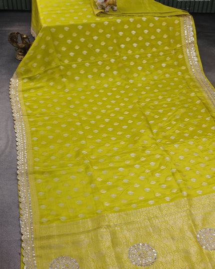 Banarasi silk saree lime green with allover silver & gold zari woven buttas and mirror work embroidery border