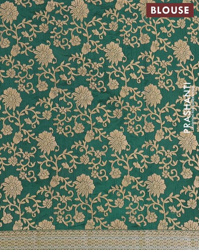 Semi raw silk saree bottle green with zari woven buttas and zari woven border