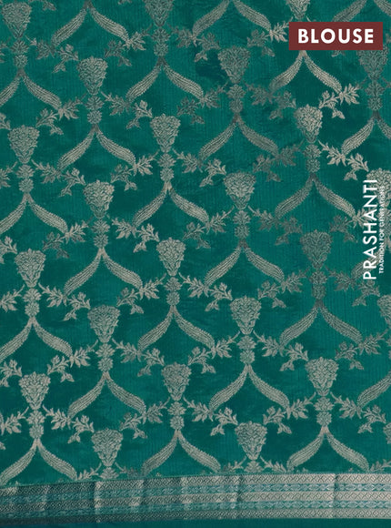 Semi raw silk saree teal green with zari woven buttas and zari woven border