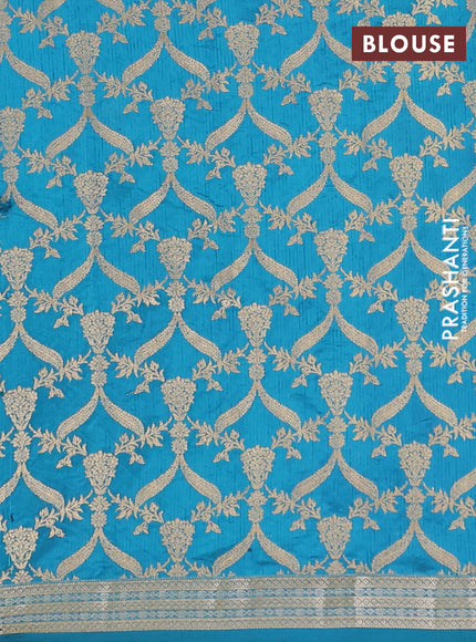 Semi raw silk saree cs blue with zari woven buttas and zari woven border
