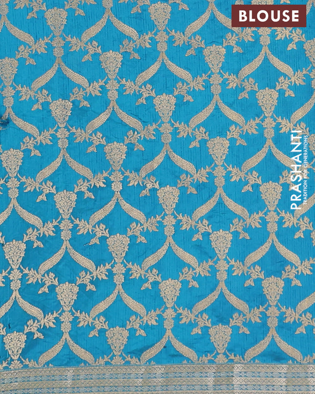 Semi raw silk saree cs blue with zari woven buttas and zari woven border