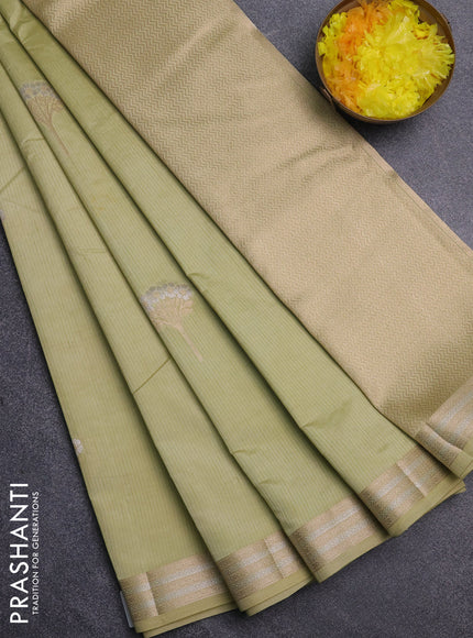 Semi raw silk saree pale yellow with zari woven buttas and zari woven border