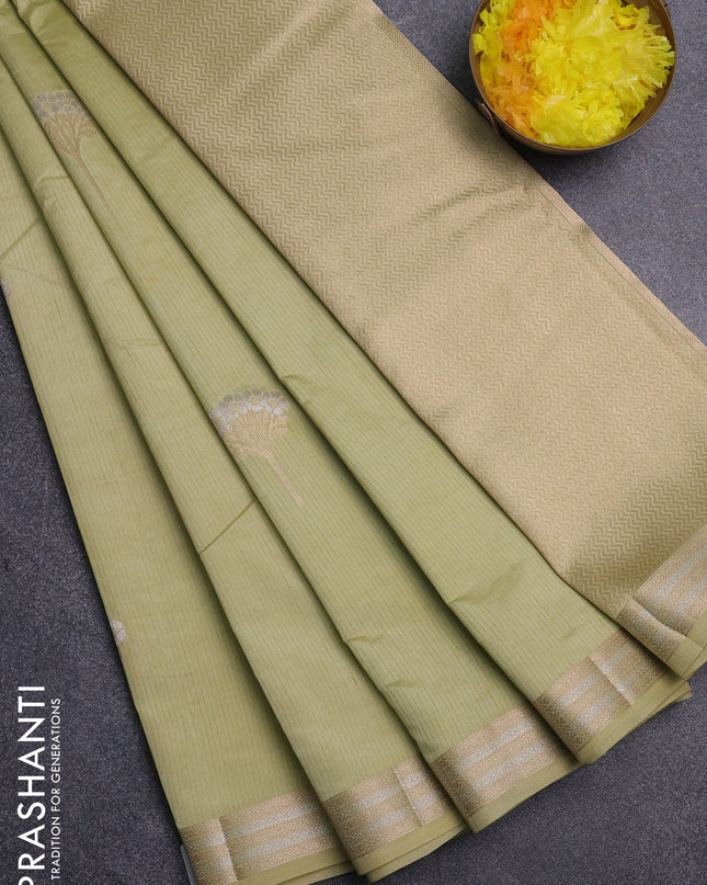 Semi raw silk saree pale yellow with zari woven buttas and zari woven border