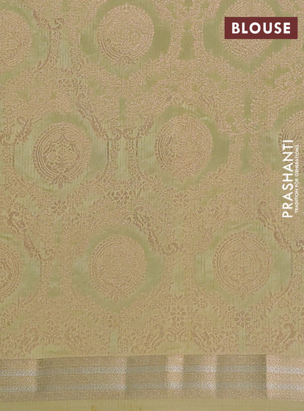 Semi raw silk saree pale yellow with zari woven buttas and zari woven border