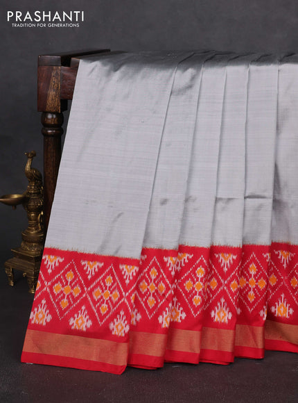 Pochampally silk saree grey and red with plain body and long ikat woven zari border