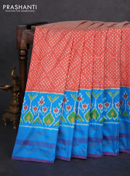 Pochampally silk saree rustic orange and cs blue with allover ikat butta weaves and long ikat woven simple border