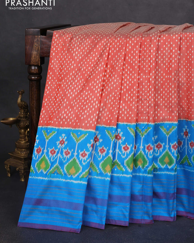 Pochampally silk saree rustic orange and cs blue with allover ikat butta weaves and long ikat woven simple border