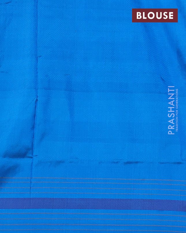 Pochampally silk saree rustic orange and cs blue with allover ikat butta weaves and long ikat woven simple border