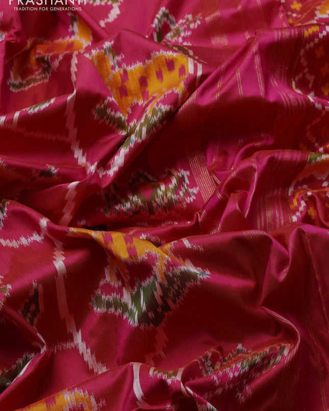 Pochampally silk saree dual shade of pink and green with allover patola weaves and zari woven border