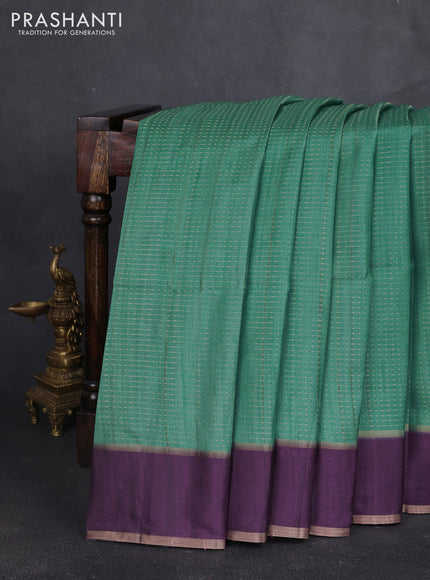 Semi tussar saree teal green and deep purple with allover zari weaves and rettapet zari woven border