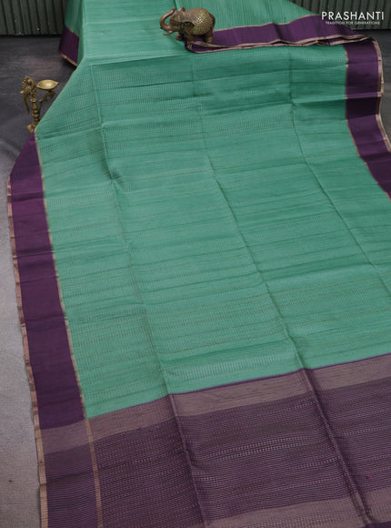 Semi tussar saree teal green and deep purple with allover zari weaves and rettapet zari woven border