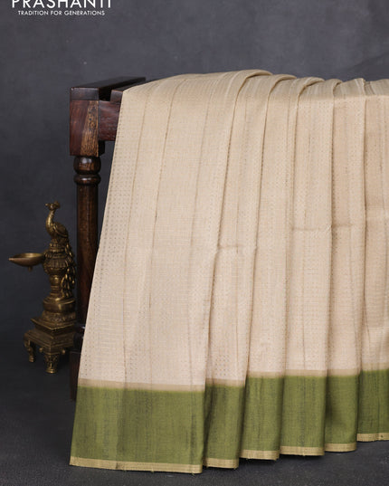 Semi tussar saree beige and light green with allover zari weaves and rettapet zari woven border