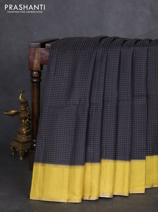 Semi tussar saree black and lime yellow with allover zari weaves and rettapet zari woven border
