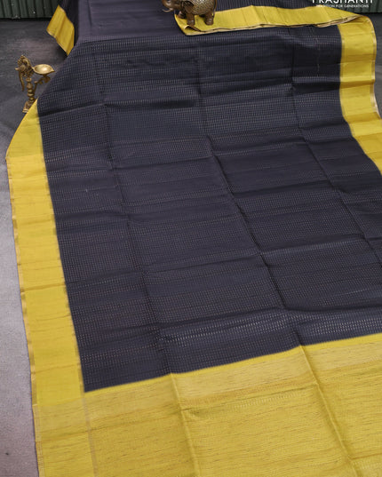 Semi tussar saree black and lime yellow with allover zari weaves and rettapet zari woven border