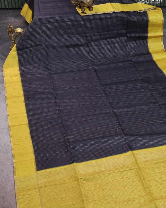 Semi tussar saree black and lime yellow with allover zari weaves and rettapet zari woven border