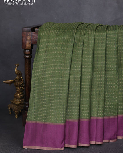 Semi tussar saree green and purple with allover zari weaves and rettapet zai woven border