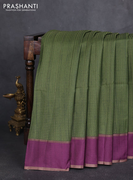 Semi tussar saree green and purple with allover zari weaves and rettapet zai woven border