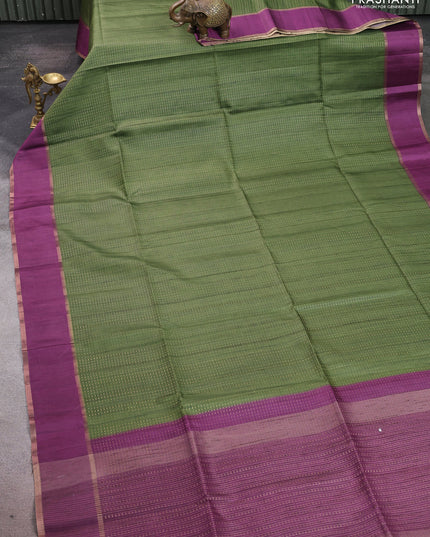 Semi tussar saree green and purple with allover zari weaves and rettapet zai woven border
