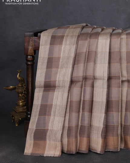 Pure dupion silk saree beige grey and grey with allover zari woven checked pattern and concept printed pallu