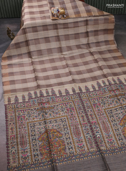 Pure dupion silk saree beige grey and grey with allover zari woven checked pattern and concept printed pallu