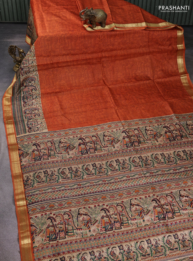 Pure printed silk saree orange with allover prints and madhubani printed zari woven border