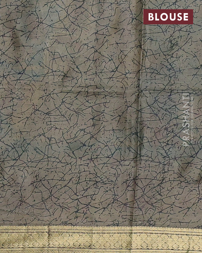 Pure printed silk saree teal blue and beige with allover kalamkari prints and zari woven border