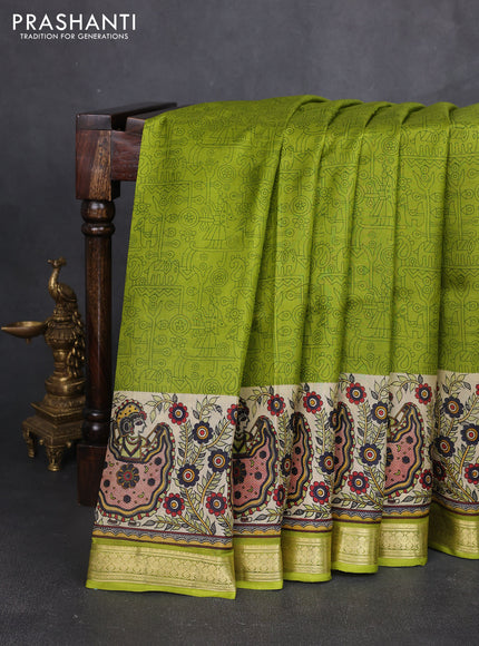 Pure printed silk saree light green with allover prints and madhubani printed zari woven border