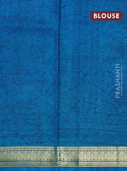 Pure printed silk saree cs blue with allover prints and madhubani printed zari woven border