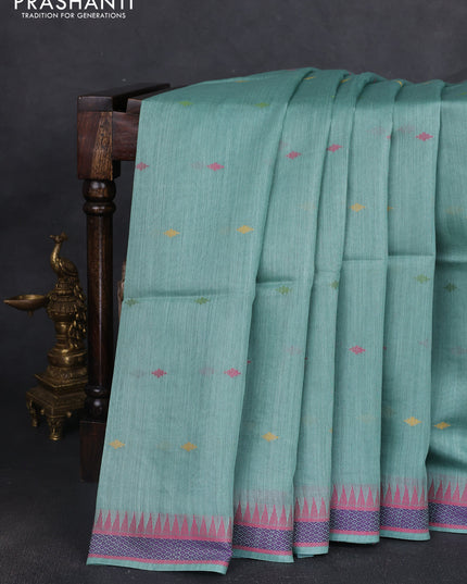 Munga tussar silk saree pastel green shade and pink with thread woven geomatric buttas and organza pallu