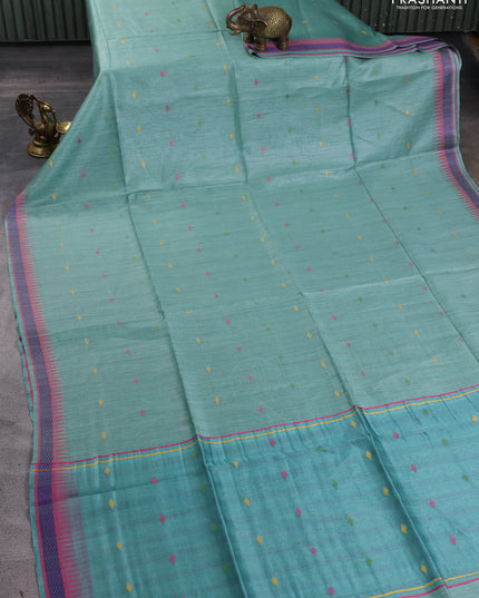 Munga tussar silk saree pastel green shade and pink with thread woven geomatric buttas and organza pallu