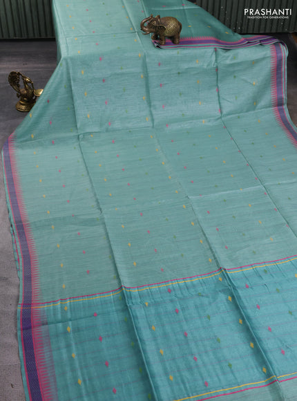 Munga tussar silk saree pastel green shade and pink with thread woven geomatric buttas and organza pallu
