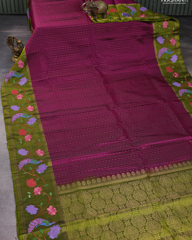 Pure soft silk saree wine shade and mehendi green with allover zari weaves and zari woven embroidery border