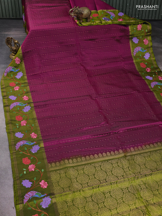 Pure soft silk saree wine shade and mehendi green with allover zari weaves and zari woven embroidery border