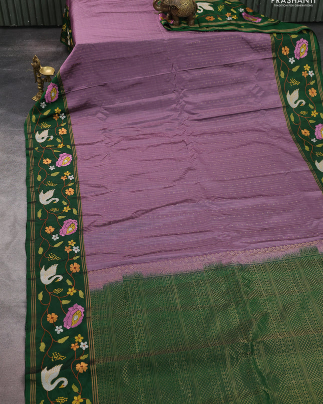 Pure soft silk saree purple shade and green with allover zari weaves and zari woven embroidery border
