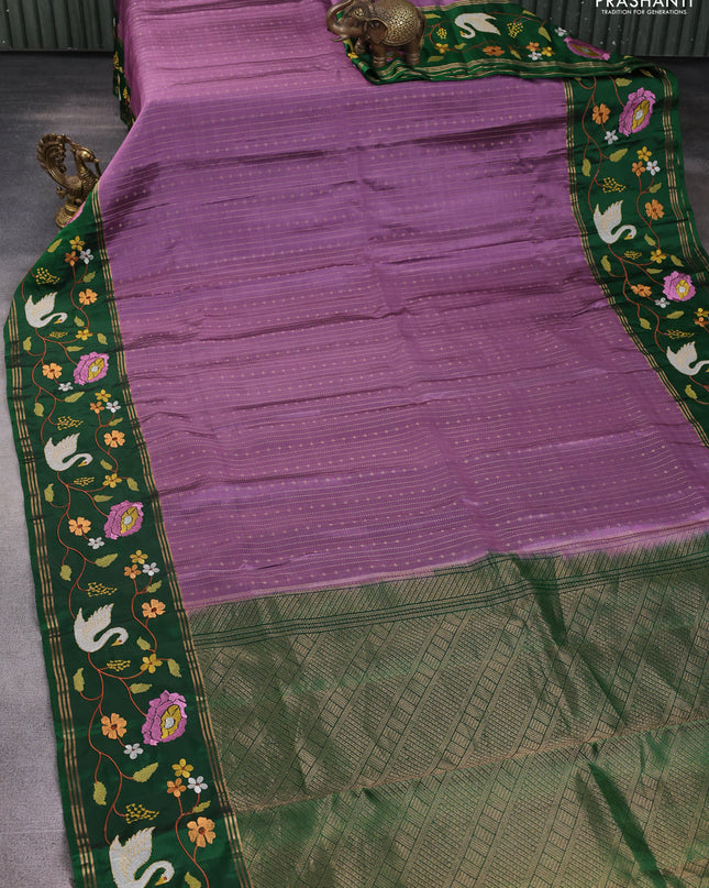 Pure soft silk saree purple shade and green with allover zari weaves and zari woven embroidery border
