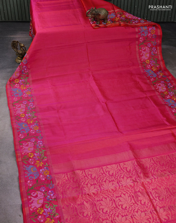 Pure soft silk saree dual shade of pinkish orange with allover zari weaves and zari woven embroidery border
