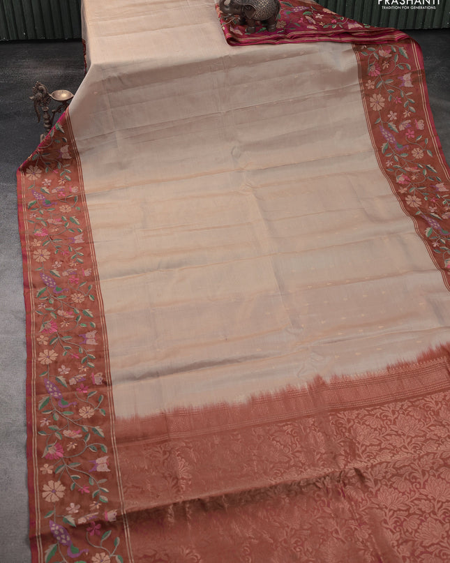 Pure soft silk saree cream and dual shade of pink with allover zari woven buttas and zari woven embroidery border