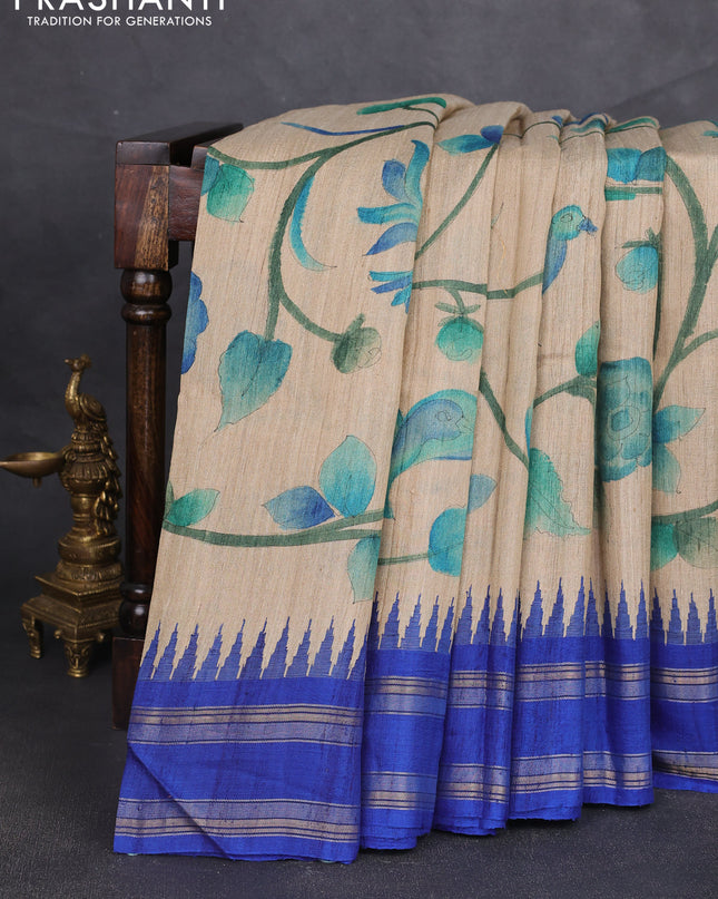 Pure tussar silk saree beige and royal blue with allover kalamkari hand painted prints and temple design rettatpet zari woven border