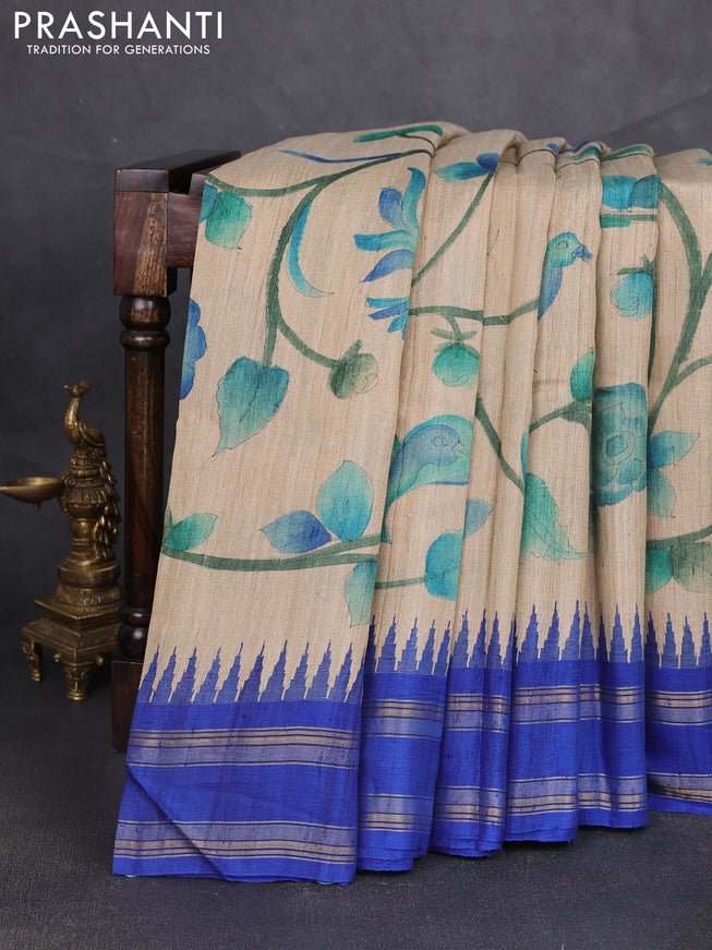 Pure tussar silk saree beige and royal blue with allover kalamkari hand painted prints and temple design rettatpet zari woven border