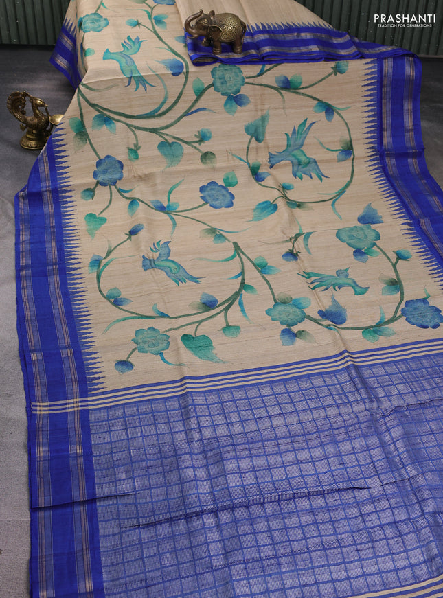 Pure tussar silk saree beige and royal blue with allover kalamkari hand painted prints and temple design rettatpet zari woven border