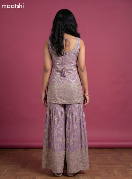 Pastel Lavender Tissue Party Wear With Allover Zari Weaves Suit