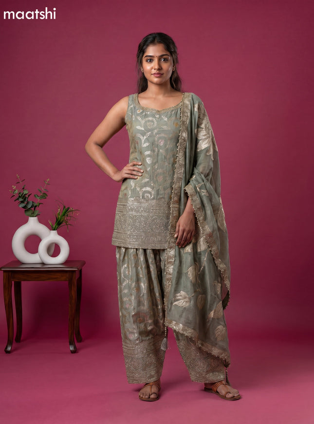 Mint Green Tissue Party Wear With Allover Zari Weaves Suit