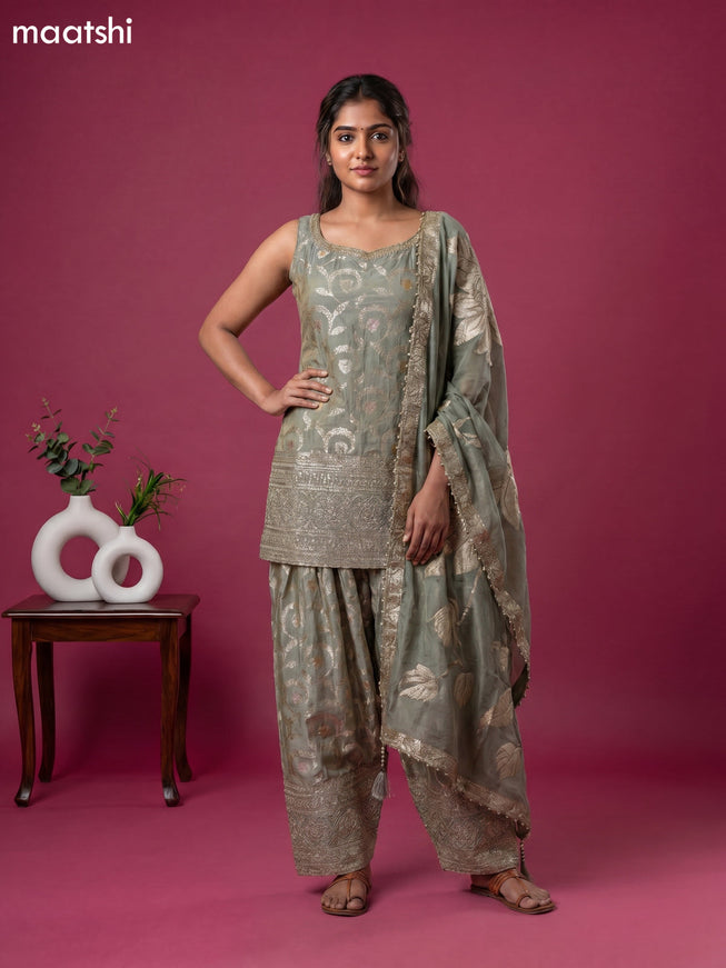 Mint Green Tissue Party Wear With Allover Zari Weaves Suit