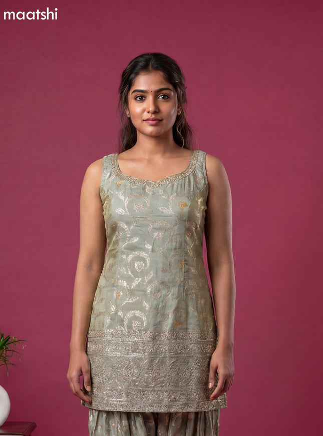 Mint Green Tissue Party Wear With Allover Zari Weaves Suit