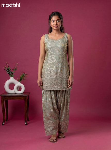 Mint Green Tissue Party Wear With Allover Zari Weaves Suit