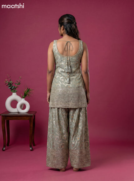 Mint Green Tissue Party Wear With Allover Zari Weaves Suit
