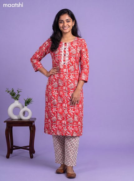 Cotton readymade kurti set red and off white with allover floral prints & simple neck pattern and straight cut pant