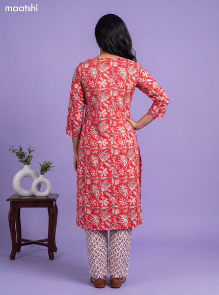 Cotton readymade kurti set red and off white with allover floral prints & simple neck pattern and straight cut pant