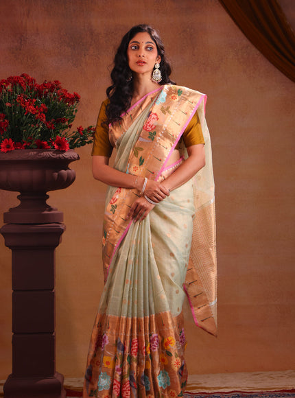 Zari Kota Pastel Green And Pink With Zari Buttas And Skirt Type Border